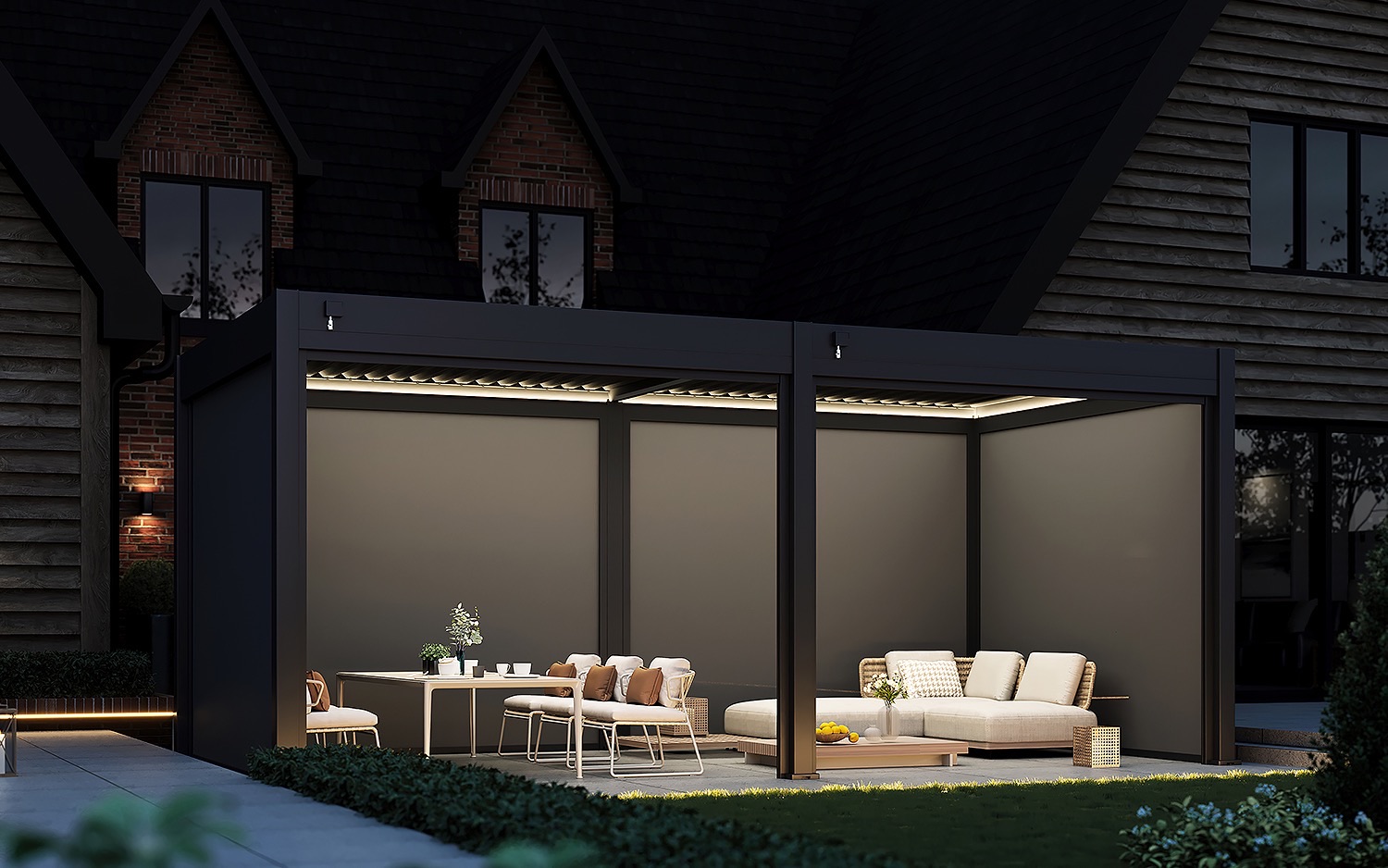 Hygge Pergola Pro at night, blinds down and the lighting on, 6m × 3m pictured