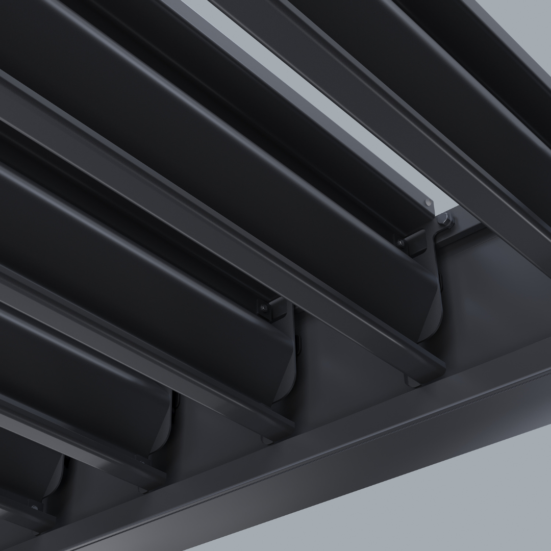 Close-up of adjustable grey aluminium louvres on a Hygge Pergola