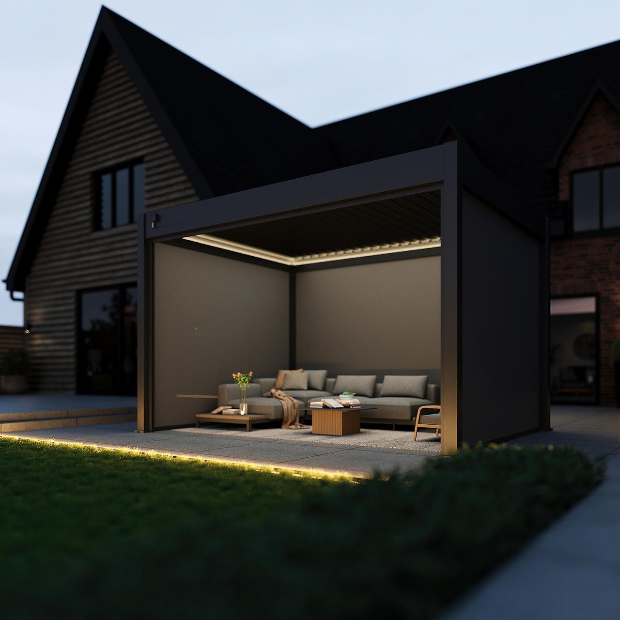 Pergola frame with black laser-cut screens providing partial shade, set on a composite deck with modern outdoor lounge chairs and low-lying greenery.