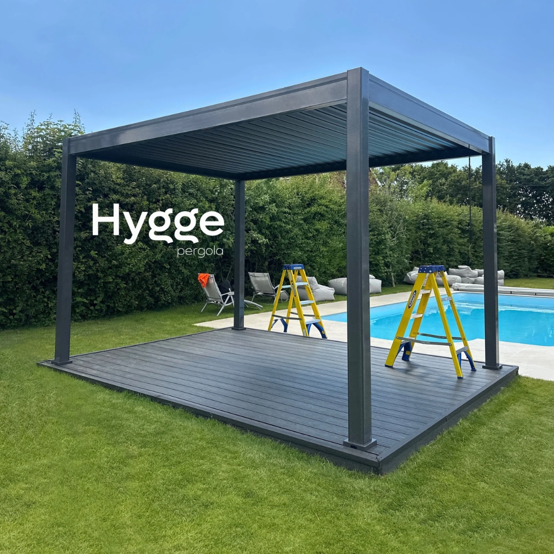Premium aluminium pergola installed by a swimming pool, providing shade and elegance.